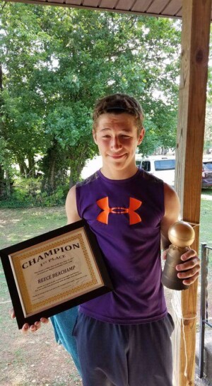 Colcord FBC reece with his reward and trophy at grand lake baptist assembly