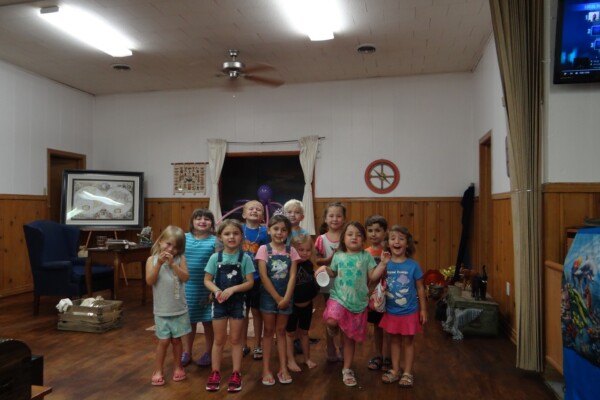 Group picture of kids on church stage
