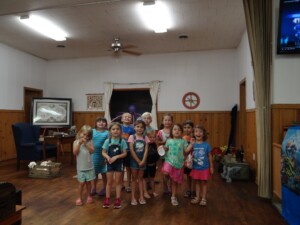 Group picture of kids on church stage