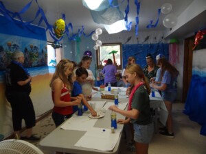 Kids doing crafts activity in the church basement
