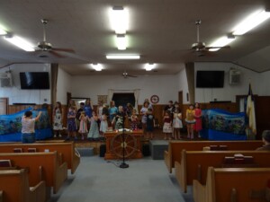 Kids practicing music during vacation bible school at the FBC colcord church building