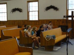 Kids in church sanctuary during missions lesson